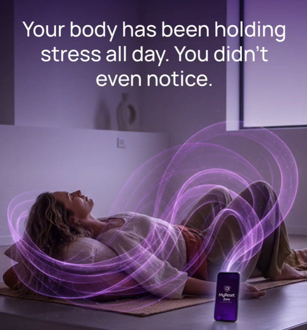 Woman lying on a mat with sound waves flowing from the MyReset Zone app around her